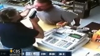 Watch Liquor store cashier pulls gun on wouldbe robber [upl. by Nitaf]